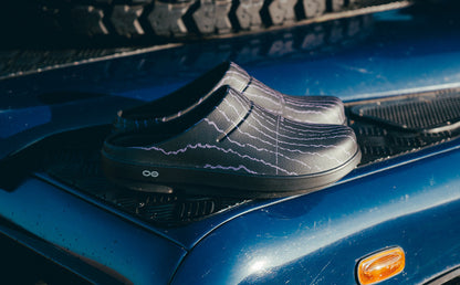 Usal x OOFOS Cochno Clog on car | lifestyle