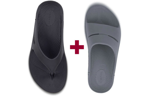 Two pairs of sandals, one black and one gray, on a white background with a red plus sign between them.
