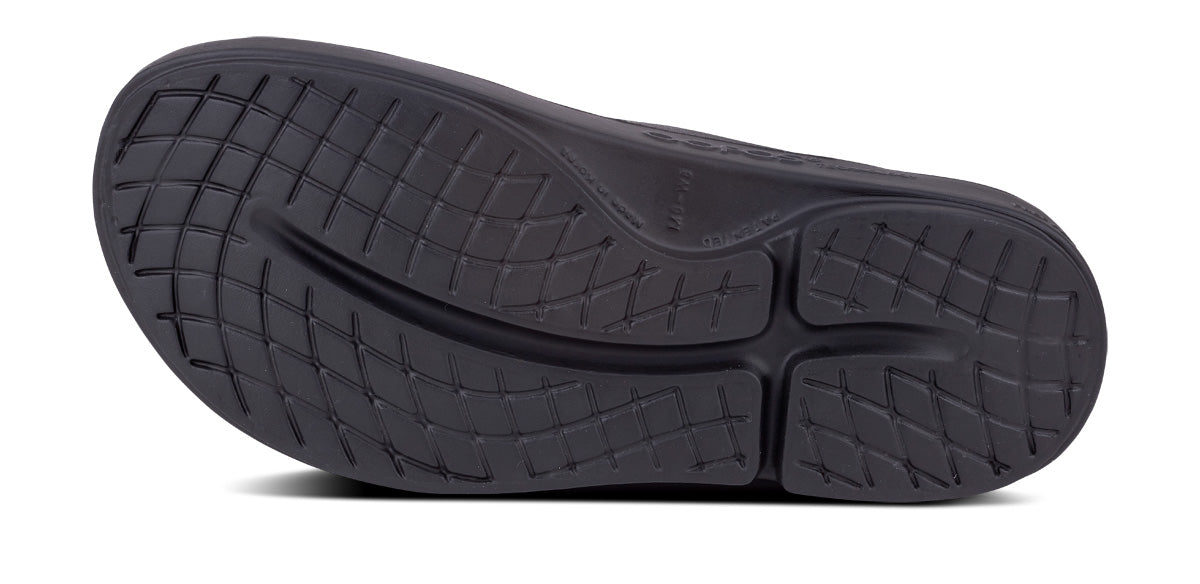 Women's OOahh Slide Sandal - Black - OOFOS bottom view