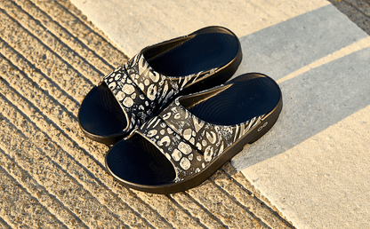Women's OOahh Limited Slide Sandal - Combo Camo product on pavement outside | lifestyle