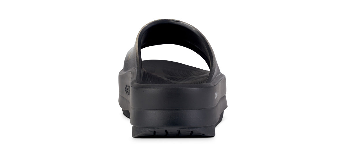 Women's OOmega OOahh Luxe Sandal - Latte back view