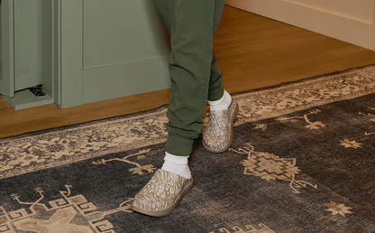 Women's OOcloog Limited Edition Clog - Nomad Combo Camo model walking on rug inside | lifestyle