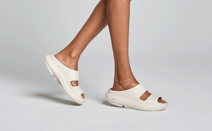 Women's OOyea Slide Sandal - Chalk model walking in studio | lifestyle