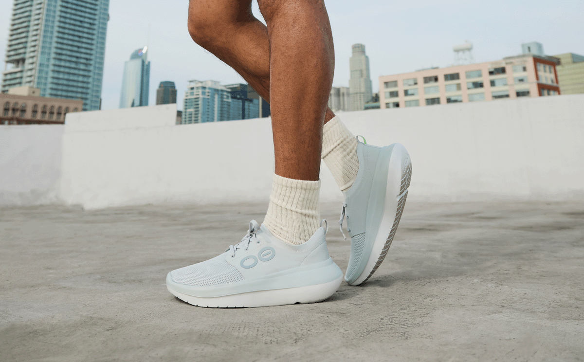 Men's OOmy Stride - Glacier side view of model standing outside | lifestyle
