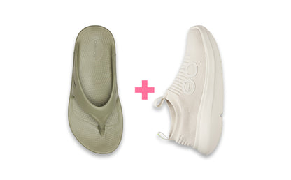 Pair of green flip-flops and white sneakers on a white background