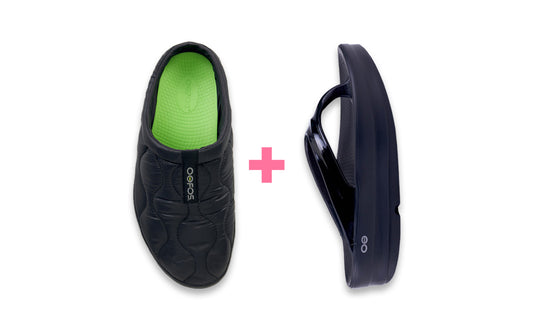 Black slip-on shoe with green lining and black clip on a white background