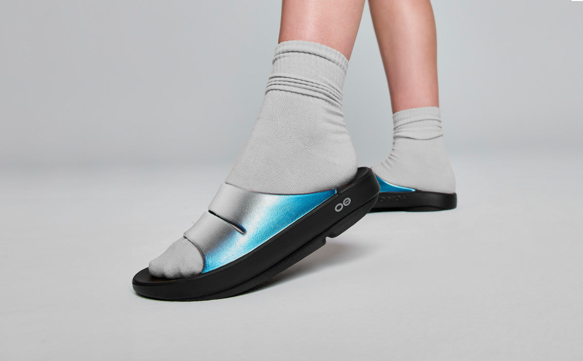 Women's OOahh Luxe Sandal - Frost model posing in studio | lifestyle