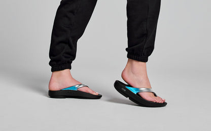 Women's OOlala Luxe Sandal - Frost model posing in studio | lifestyle
