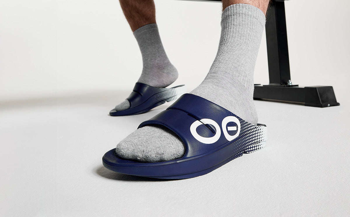 Men's OOahh Sport Slide Sandal - Navy Matrix close up of shoes on model in studio | lifestyle