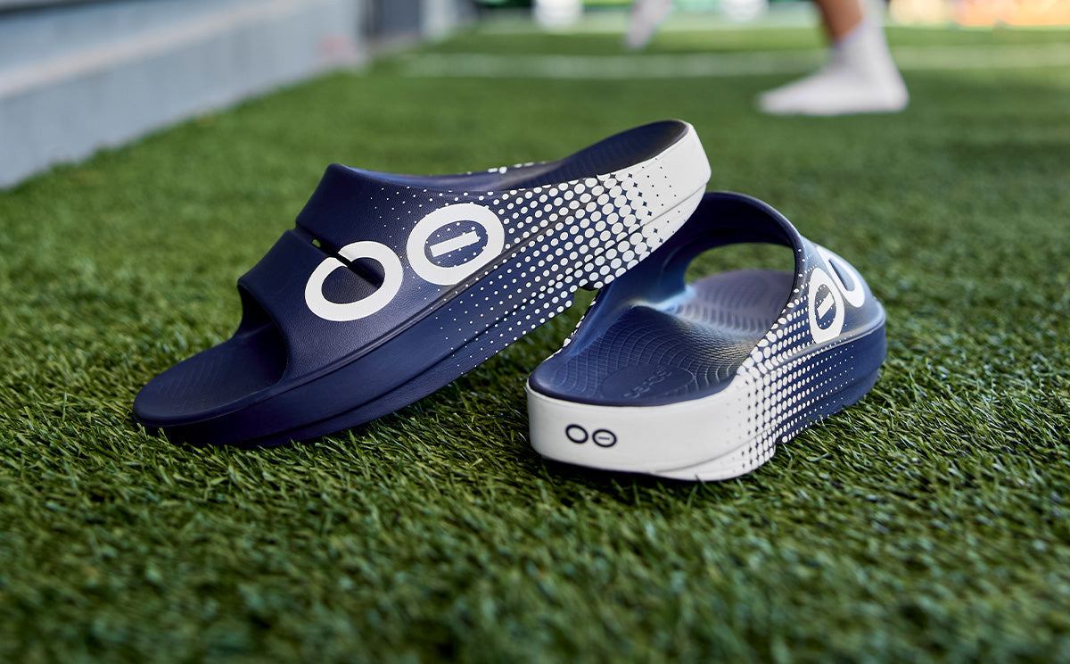 Women's OOahh Sport Slide Sandal - Navy Matrix shoes on field | lifestyle