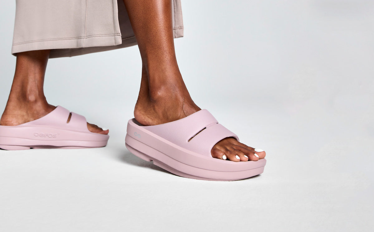 Women's OOmega OOahh Sandal - Stardust model posing in studio | lifestyle