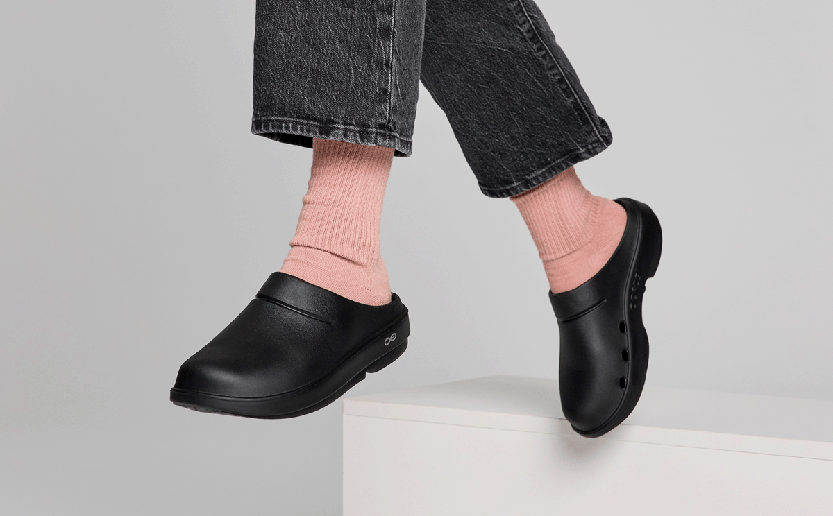 Women's OOcloog Clog - Black model standing on block in studio | lifestyle