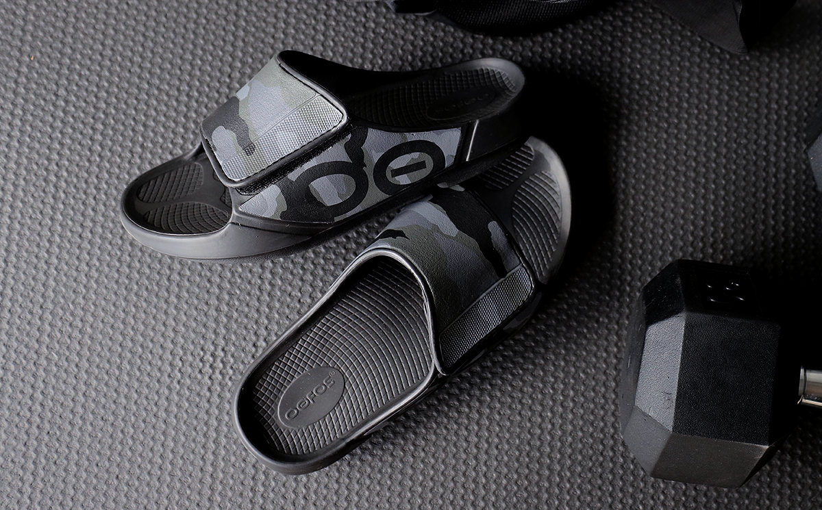 Women's OOahh Sport Flex Sandal - Black Camo shoes on workout mat