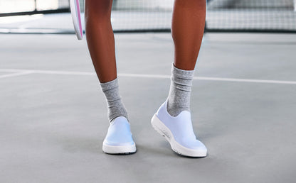 Woman wearing Purple Jade OOmg eeZee Low Shoe at pickleball court